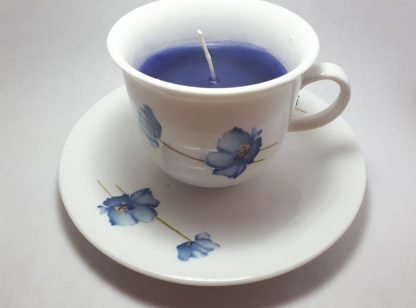 Donkerblauwe Kaars In Bloemetjeskopje